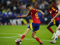 Pedri central midfield of Spain and FC Barcelona does passed  during the UEFA EURO 2024 group stage match between Spain and Italy at Arena A...