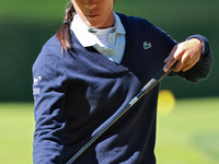 Celine Boutier of France checks her putter on the 17th green during the first round of the KPMG Women's PGA Championship at Sahalee Country...