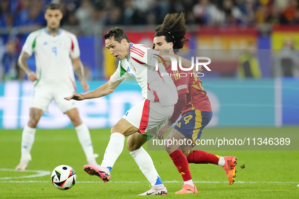 Federico Chiesa left winger of Italy and Juventus FC and Marc Cucurella left-back of Spain and Chelsea FC compete for the ball during the UE...