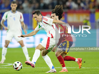 Federico Chiesa left winger of Italy and Juventus FC and Marc Cucurella left-back of Spain and Chelsea FC compete for the ball during the UE...