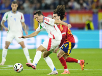 Federico Chiesa left winger of Italy and Juventus FC and Marc Cucurella left-back of Spain and Chelsea FC compete for the ball during the UE...