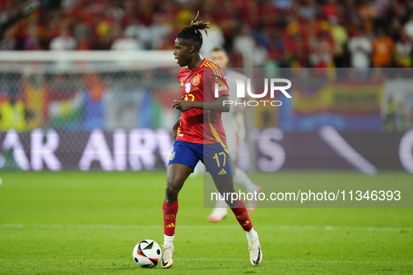 Nico Williams left winger of Spain and Athletic Club Bilbao controls the ball during the UEFA EURO 2024 group stage match between Spain and...