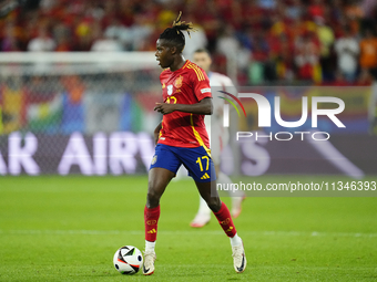 Nico Williams left winger of Spain and Athletic Club Bilbao controls the ball during the UEFA EURO 2024 group stage match between Spain and...