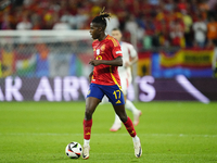 Nico Williams left winger of Spain and Athletic Club Bilbao controls the ball during the UEFA EURO 2024 group stage match between Spain and...