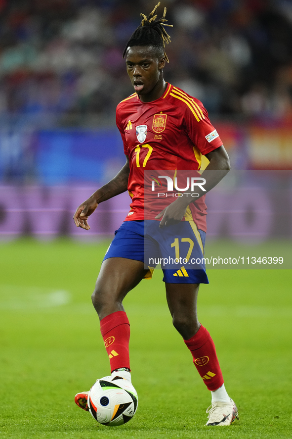 Nico Williams left winger of Spain and Athletic Club Bilbao controls the ball during the UEFA EURO 2024 group stage match between Spain and...