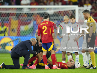 Rodrigo Hernandez defensive midfield of Spain and Manchester City lies injured on the pitch during the UEFA EURO 2024 group stage match betw...