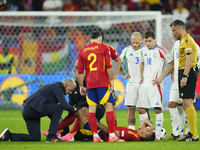 Rodrigo Hernandez defensive midfield of Spain and Manchester City lies injured on the pitch during the UEFA EURO 2024 group stage match betw...