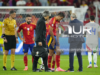 Rodrigo Hernandez defensive midfield of Spain and Manchester City lies injured on the pitch during the UEFA EURO 2024 group stage match betw...