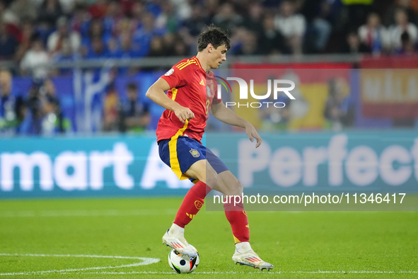 Robin Le Normand centre-back of Spain and Real Sociedad controls the ball during the UEFA EURO 2024 group stage match between Spain and Ital...