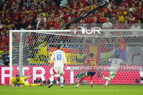 Riccardo Calafiori centre-back of Italy and Bologna FC 1909 own goal during the UEFA EURO 2024 group stage match between Spain and Italy at...