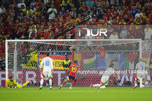 Riccardo Calafiori centre-back of Italy and Bologna FC 1909 own goal during the UEFA EURO 2024 group stage match between Spain and Italy at...