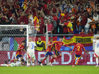 Spanish players celebrate after scoring his sides first goal during the UEFA EURO 2024 group stage match between Spain and Italy at Arena Au...