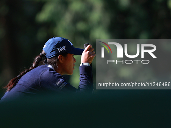 Celine Boutier of France lines up her putt on the 15th green during Day One of the KPMG Women's PGA Championship at Sahalee Country Club in...