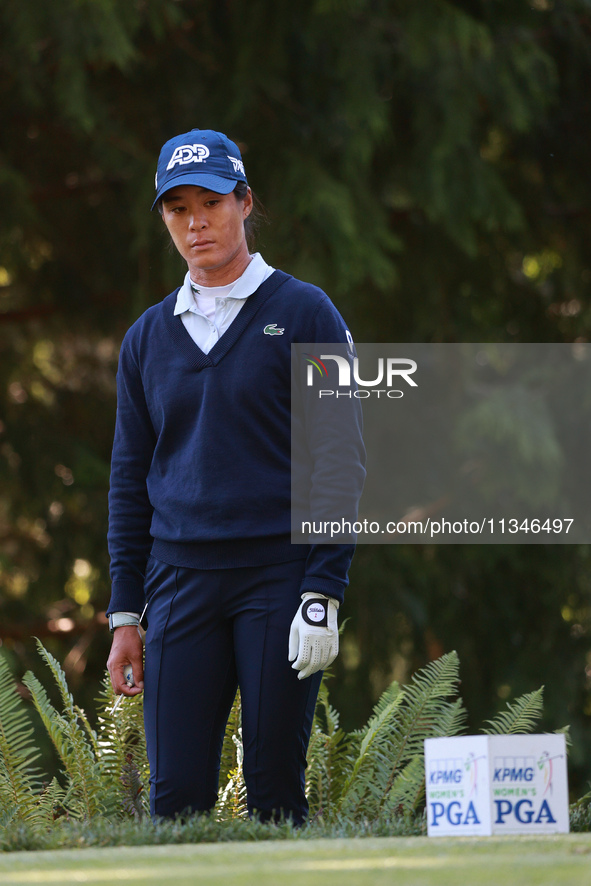 Celine Boutier of France waits on the 15th hole during Day One of the KPMG Women's PGA Championship at Sahalee Country Club in Sammamish, Wa...