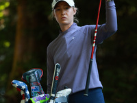 Nelly Korda of the United States pulls a club from her bag as she prepares to tee off on16th hole during Day One of the KPMG Women's PGA Cha...