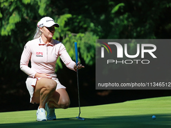 Charley Hull of England lines up her putt on the 15th green during Day One of the KPMG Women's PGA Championship at Sahalee Country Club in S...