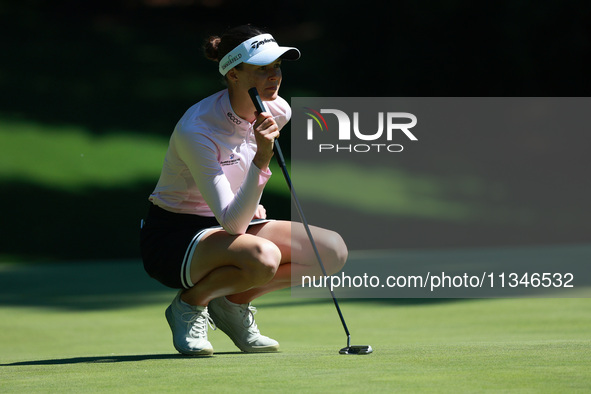 Esther Henseleit of Germany lines up her putt on the 16th green during Day One of the KPMG Women's PGA Championship at Sahalee Country Club...