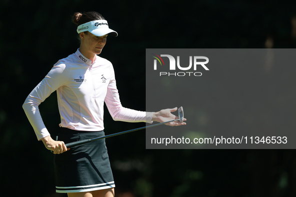 Esther Henseleit of Germany lines up her putt on the 16th green during Day One of the KPMG Women's PGA Championship at Sahalee Country Club...