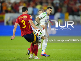 Robin Le Normand centre-back of Spain and Real Sociedad and Mattia Zaccagni left winger of Italy and SS Lazio compete for the ball during th...