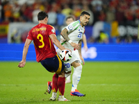 Robin Le Normand centre-back of Spain and Real Sociedad and Mattia Zaccagni left winger of Italy and SS Lazio compete for the ball during th...