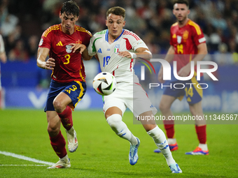 Robin Le Normand centre-back of Spain and Real Sociedad and Mateo Retegui centre-forward of Italy and Genoa CFC compete for the ball during...