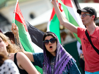 People are participating in a solidarity protest with Palestine in Krakow, Poland, on June 20, 2024, and are marching from the Main Square t...