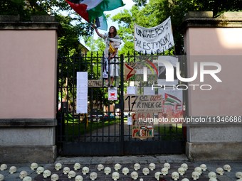 People are participating in a solidarity protest with Palestine in Krakow, Poland, on June 20, 2024, and are marching from the Main Square t...