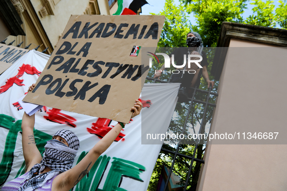 People are participating in a solidarity protest with Palestine in Krakow, Poland, on June 20, 2024, and are marching from the Main Square t...