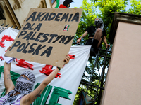 People are participating in a solidarity protest with Palestine in Krakow, Poland, on June 20, 2024, and are marching from the Main Square t...