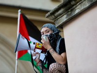 People are participating in a solidarity protest with Palestine in Krakow, Poland, on June 20, 2024, and are marching from the Main Square t...