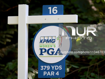 The yardage sign for the 16th tee is displayed during the first round of the KPMG Women's PGA Championship at Sahalee Country Club on Thursd...