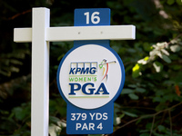 The yardage sign for the 16th tee is displayed during the first round of the KPMG Women's PGA Championship at Sahalee Country Club on Thursd...