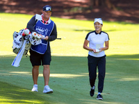 Jennifer Song of Orlando, Florida walks with her caddie on the 15th fairway during the first round of the KPMG Women's PGA Championship at S...