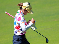 Pornanong Phatlum of Thailand makes notes as she walks on the 15th fairway during the first round of the KPMG Women's PGA Championship at Sa...