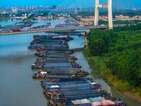 HUAI'AN, CHINA, on June 20, 2024, an aerial photo is showing a large number of ships waiting to be locked upstream of Huaian Lock on the Nor...