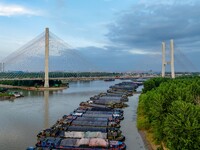 HUAI'AN, CHINA, on June 20, 2024, an aerial photo is showing a large number of ships waiting to be locked upstream of Huaian Lock on the Nor...