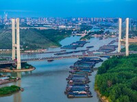 HUAI'AN, CHINA, on June 20, 2024, an aerial photo is showing a large number of ships waiting to be locked upstream of Huaian Lock on the Nor...