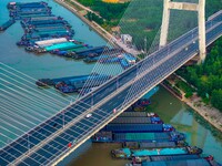 HUAI'AN, CHINA, on June 20, 2024, an aerial photo is showing a large number of ships waiting to be locked upstream of Huaian Lock on the Nor...