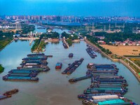 HUAI'AN, CHINA, on June 20, 2024, an aerial photo is showing a large number of ships waiting to be locked upstream of Huaian Lock on the Nor...