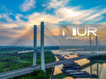 HUAI'AN, CHINA, on June 20, 2024, an aerial photo is showing a large number of ships waiting to be locked upstream of Huaian Lock on the Nor...