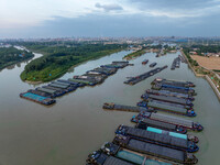 HUAI'AN, CHINA, on June 20, 2024, an aerial photo is showing a large number of ships waiting to be locked upstream of Huaian Lock on the Nor...