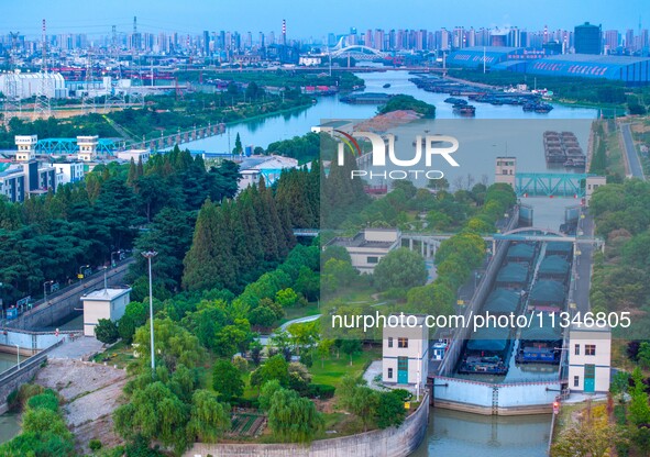 HUAI'AN, CHINA, on June 20, 2024, an aerial photo is showing a large number of ships waiting to be locked upstream of Huaian Lock on the Nor...