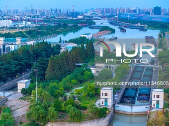 HUAI'AN, CHINA, on June 20, 2024, an aerial photo is showing a large number of ships waiting to be locked upstream of Huaian Lock on the Nor...