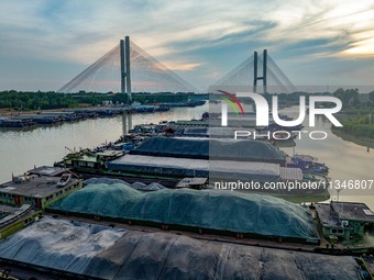 HUAI'AN, CHINA, on June 20, 2024, an aerial photo is showing a large number of ships waiting to be locked upstream of Huaian Lock on the Nor...