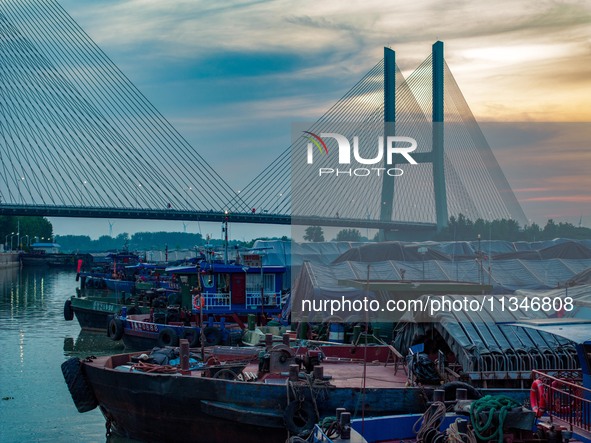 HUAI'AN, CHINA, on June 20, 2024, an aerial photo is showing a large number of ships waiting to be locked upstream of Huaian Lock on the Nor...