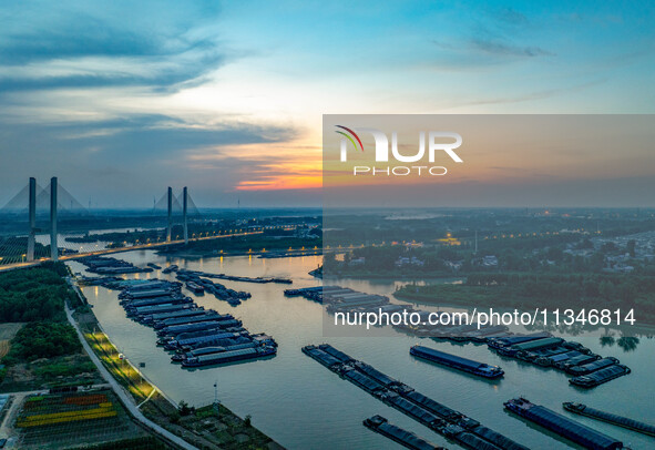 HUAI'AN, CHINA, on June 20, 2024, an aerial photo is showing a large number of ships waiting to be locked upstream of Huaian Lock on the Nor...