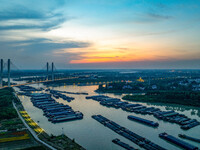 HUAI'AN, CHINA, on June 20, 2024, an aerial photo is showing a large number of ships waiting to be locked upstream of Huaian Lock on the Nor...