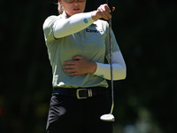 Brooke Henderson of Canada lines up her putt on the second green during Day One of the KPMG Women's PGA Championship at Sahalee Country Club...