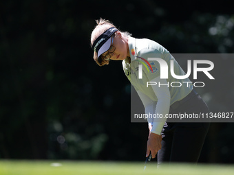 Brooke Henderson of Canada follows her putt on the second green during Day One of the KPMG Women's PGA Championship at Sahalee Country Club...