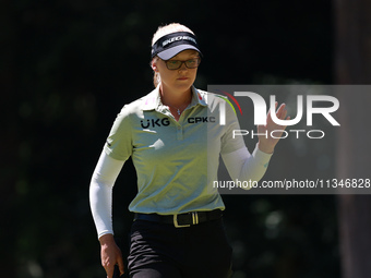 Brooke Henderson of Canada acknowledges the crowd after her birdie on the first green during Day One of the KPMG Women's PGA Championship at...